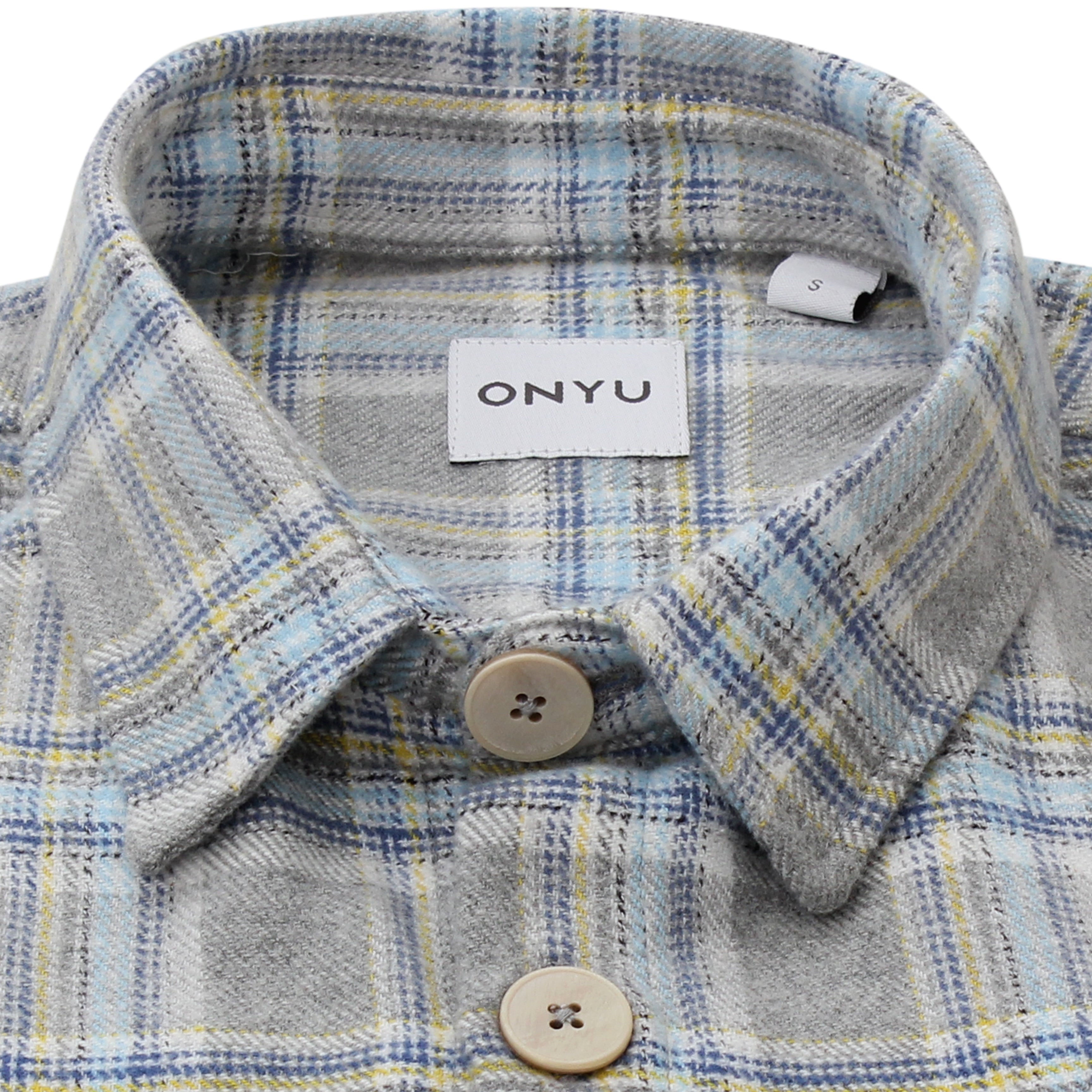 Plaid shirt with buttons and 'ONYU' label on collar